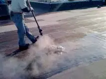 Another layer of hot asphalt