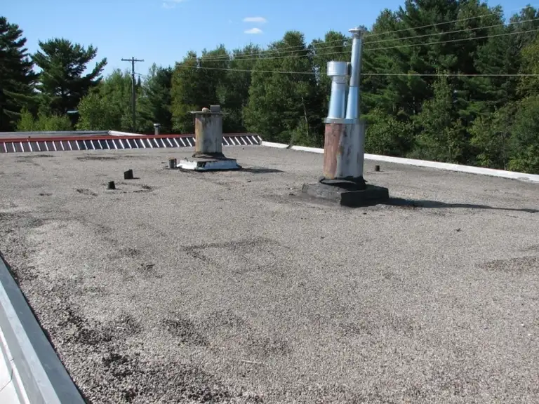 Leaking Tar & Gravel Roof